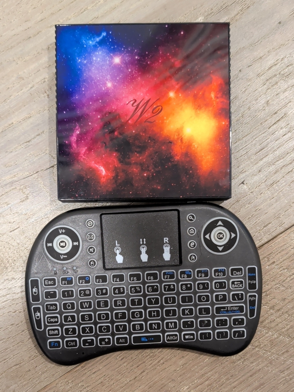 Galaxy-Print Portable Media Player with Black Wireless Mini Keyboard